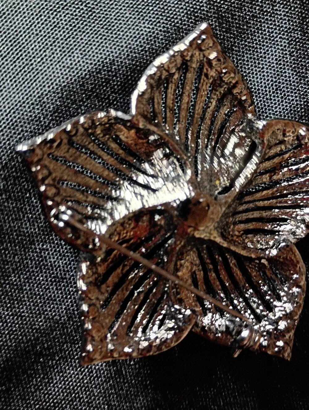 Source Unknown Black and Silver Floral Crystal Brooch